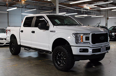 White Ford Truck for sale at our bad credit auto dealers near Alameda, California.